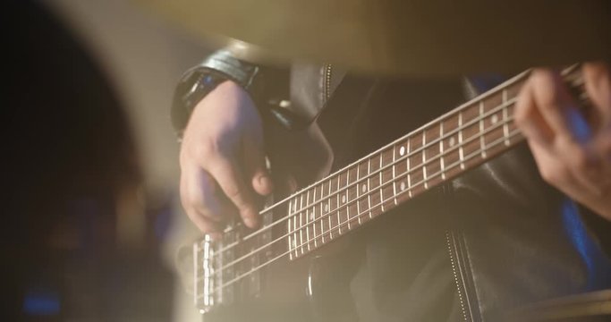 Rock duet performing. Professional guitarist and drummer rocking the party up in club, playing coll rock, punk or metal music 4k footage
