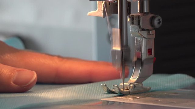 Close Up of Sewing Machine as Person Sews