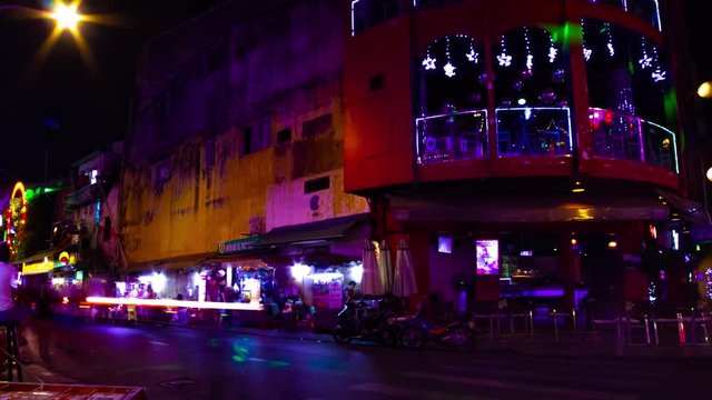 A night timelapse of the neon downtown at Bui Vien street in Ho Chi Minh Vietnam wide shot