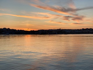 Obraz premium sunset over the river