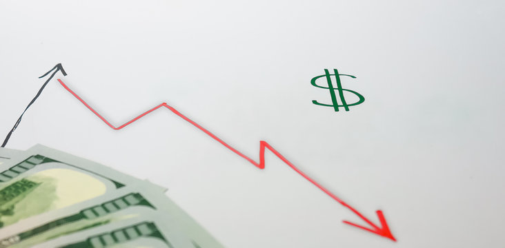 The economic crisis of the epidemic of the coronavirus. A regressive red chart falling down is drawn. $100 bills. The concept of financial loss, pandemic Covid-19. Template.