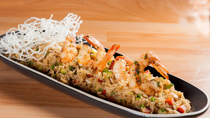 Fried rice with calamari - asian food. chaufa rice with shrimp