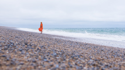 Obraz premium Monks walking at the sea.
