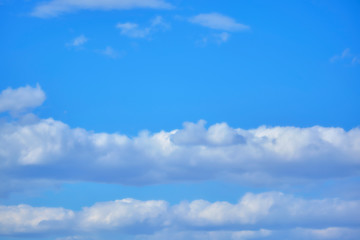 Naklejka na ściany i meble strip of clouds in the blue sky color
