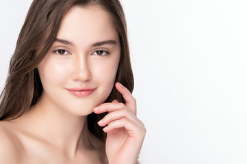 Beautiful Young Woman touching her clean face with fresh Healthy Skin, isolated on white background, Beauty Cosmetics and Facial treatment Concept