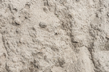 Crust on the dried sand after a downpour