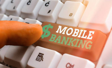 Conceptual hand writing showing Mobile Banking. Concept meaning Monitoring account balances...