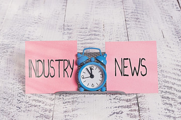 Writing note showing Industry News. Business concept for Technical Market Report Manufacturing...