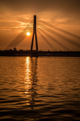 Fototapeta na wymiar Sunset in Riga over a river of Daugava
