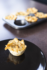 plant-based food, filo pastry cups with vegan filling just out of the oven