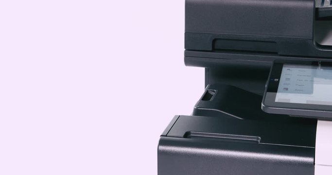 Paper coming out of photocopier