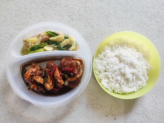 Rice, Chicken Black Pepper and Saute Corn for Office Lunch. Selective Focus