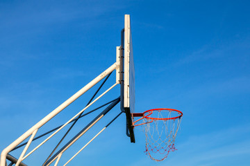  Side view Basketball hoop with clear blue sky