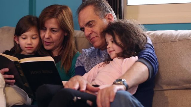 Family Reading the Bible together