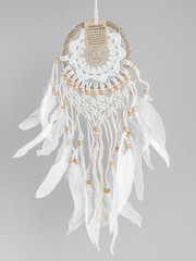 White dreamcatcher - Indian amulet that protects the sleeper from evil spirits and diseases. Card with instructions