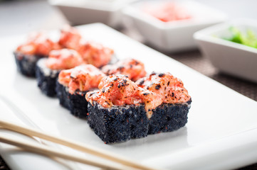 Hot sushi komacu maki on a dish