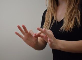 Woman interpreting American Sign Language