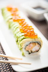 Uramaki sushi sun maki on a dish