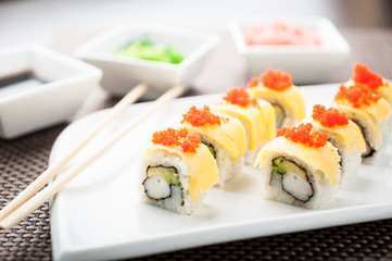 Uramaki sushi mango classic maki on a dish