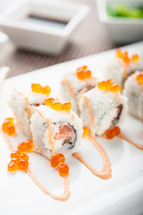 White uramaki sushi grilled salmon rolls maki
