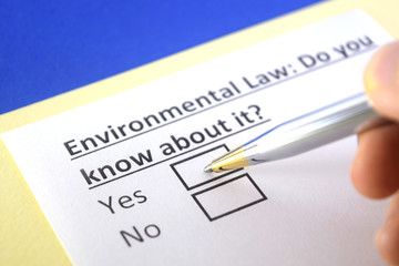 Obraz premium One person is answering question about environmental law.