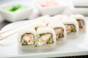 Uramaki sushi tempura maki on a dish