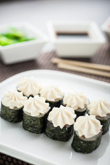 Hosomaki sushi surimi cheese hosomaki on a dish