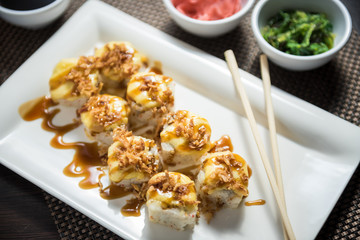 Hot sushi fritter maki with cooked salmon