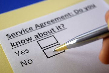 One person is answering question about service agreement.