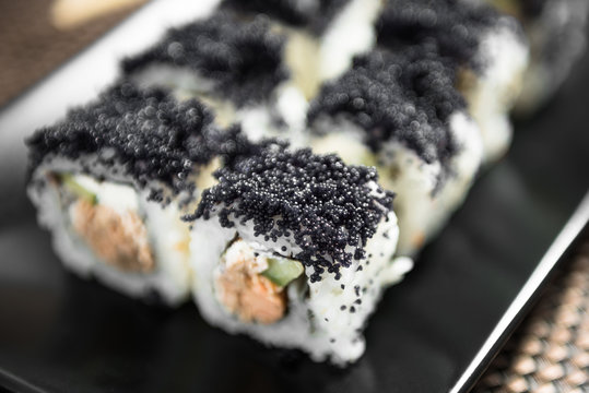 Sushi maki zuko maki with cooked salmon, cheese