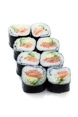 Sushi uramaki rolls with seaweed around them