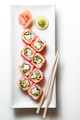 Sushi maki rolls with masago caviar around them