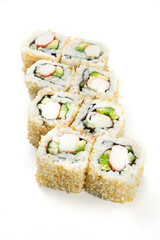 Sushi maki rolls with sesame seeds around them
