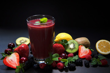 fruit and juice hight vitamin for healthy and lose weight is colorful on black background 