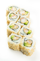 Sushi maki rolls with sesame seeds around them