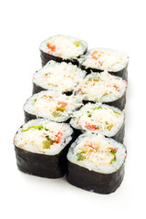 Sushi uramaki rolls with seaweed around them