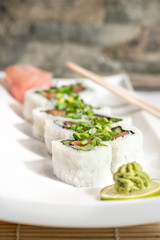 Sushi maki rolls with salmon, cucumber