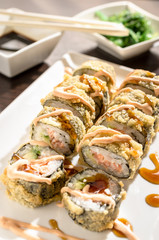 SAKE AVOKADO TEMPURA hot sushi rolls with salmon