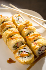 SAKE AVOKADO TEMPURA hot sushi rolls with salmon