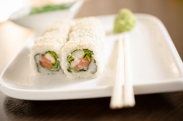 SAKURA CHEESE MAKI sushi rolls with salmon