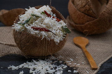 Coconut rice pilaf served in coconut shell