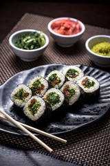 Vegetarian and vegan sushi maki with dried tomato