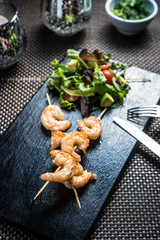 Tiger prawn skewer in sweet honey sauce with lime