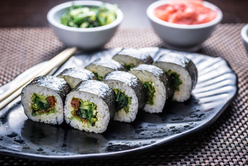 Vegetarian and vegan sushi maki with dried tomato