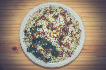 Basmati fried rice plate on a table top view