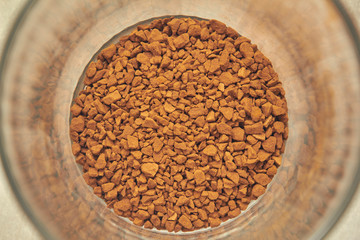 instant coffee in a glass cup. close up