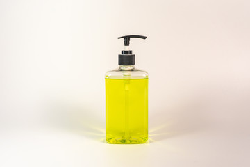 Bottle of hand sanitizer liquid gel on white background
