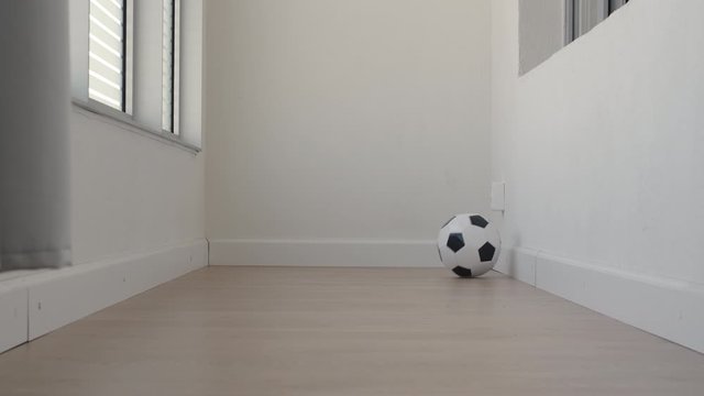 Game over. Football ball rolling on balcony. Finish the training at home.