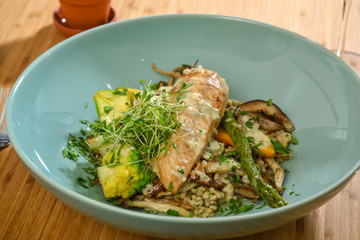 Atlantic cod dish served with asparagus, mushrooms and cauliflower