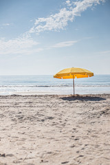 beach umbrella and chairs